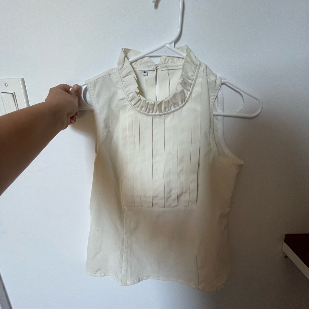 White top frilled sleeveless